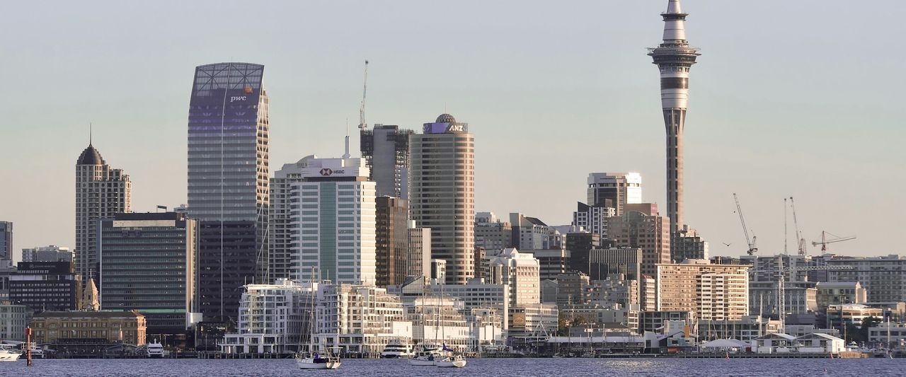The Auckland skyline and Sky Tower seen across the harbour on a clear day